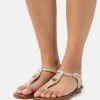 MICHAEL Michael Kors Damen MALLORY THONG - Riemensandalette - Pale Gold -Michael Kors Verkäufe 792c751be6ad47ee85a925242f56461b